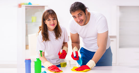 husband and wife cleaning
