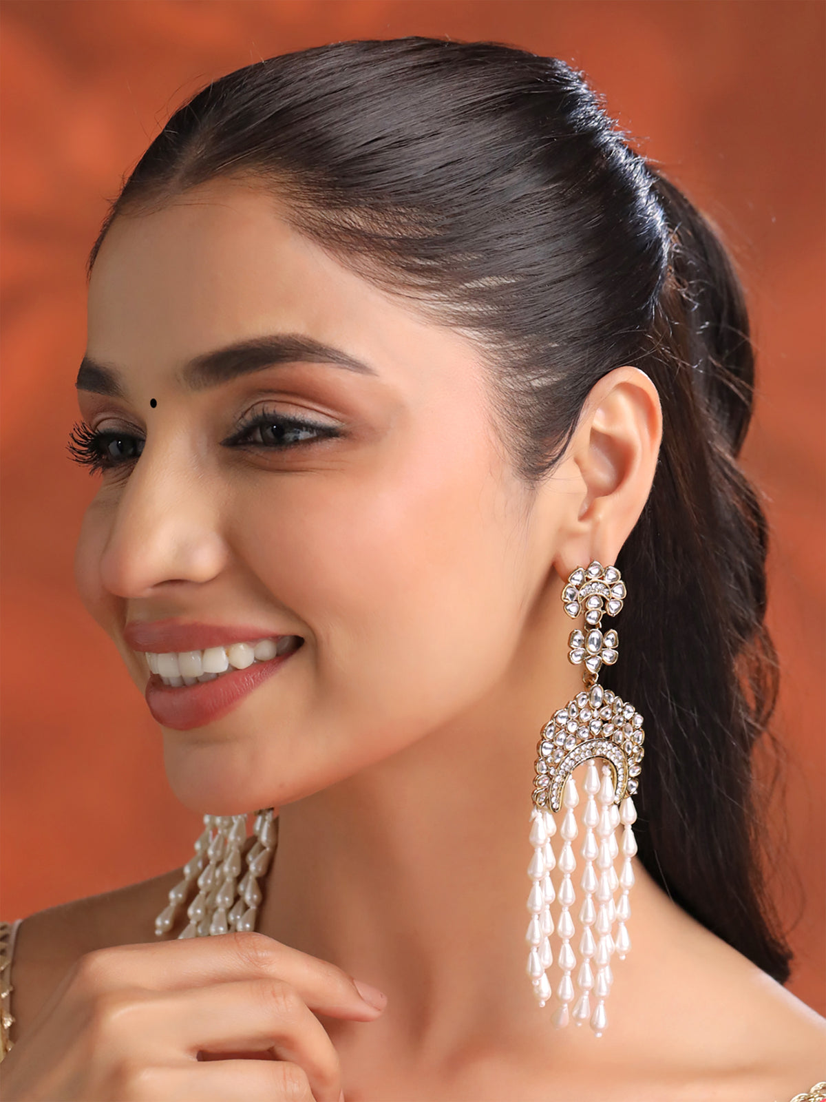 Yellow Chimes golden dangler earrings - Stunning design to impress