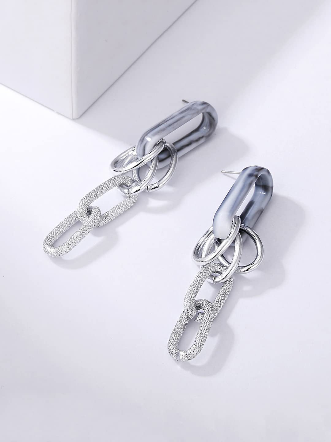 unwind silver toned earrings - stylish everyday wear