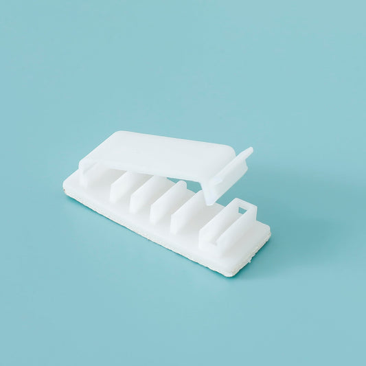 Cheston cable organizer kit - self-adhesive clips in use
