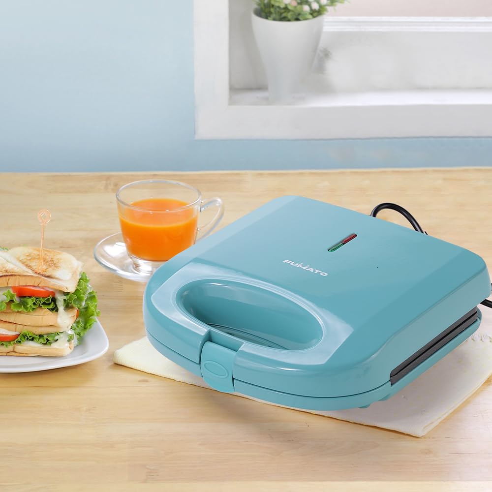 The Better Home FUMATO 750 W 2 Slice Toast Sandwich Maker | Non-stick Aluminium Plates, Cool Touch Technology, Power Indicator, Upright Compact Storage, Buckle Clip Lock | 1 Yr Warranty- Misty Blue